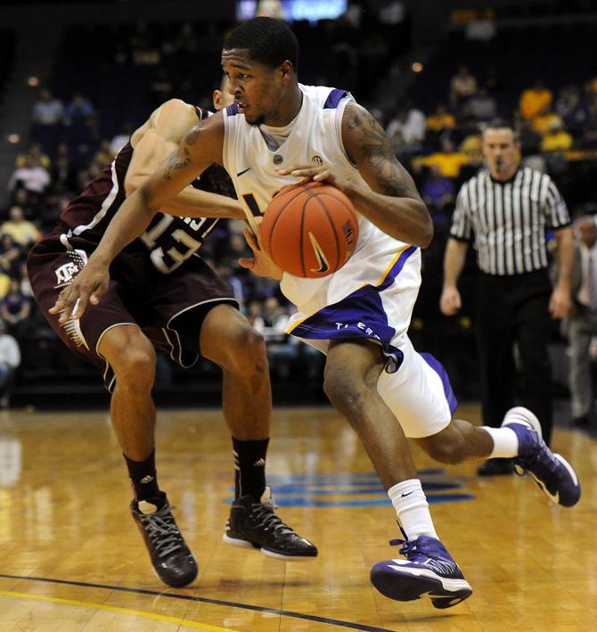 LSU freshman guard (24) dribbles Wednesday, Jan. 23, 2013 in the 58-54 victory over Texas A&amp;M in the PMAC.
 