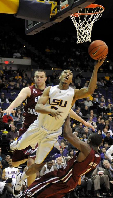 LSU senior guard Charles Carmouche (0) lays up Wednesday, Jan. 16, 2013 the basketball for a score in the 73-82 overtime loss to University of South Carolina in the PMAC.
 