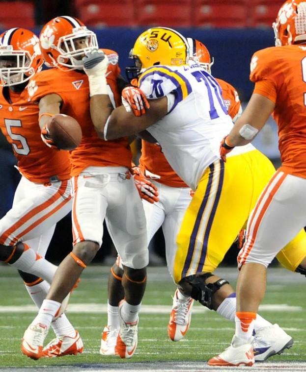 LSU sophomore offensive guard La'El Collins (70) commits a personal foul during LSU's 24-25 loss to Clemson in the Chick-fil-A Bowl in Atlanta, Ga.