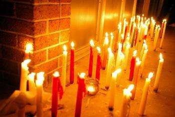 In this 2008 file photo, Students, friends, teachers and collegues of Ph.D. students Chandrasekhar Reddy Komma and Kiran Kumar Allam participate in a candlelight vigil.
 