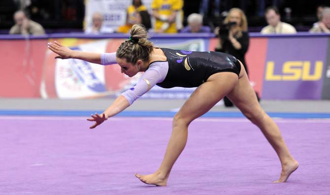 LSU sophomore all-around Jessie Jordan flips in the middle of her floor routine Jan. 4, 2013 during the Tiger's 196-194 win over NC State in the PMAC.
 