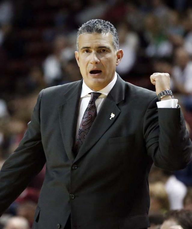 South Carolina basketball coach Frank Martin shouts to his team in the first half of their NCAA college basketball game against Mississippi State in Starkville, Miss., Wednesday, Jan. 9, 2013. Mississippi State won 56-54. (AP Photo/Rogelio V. Solis)
 