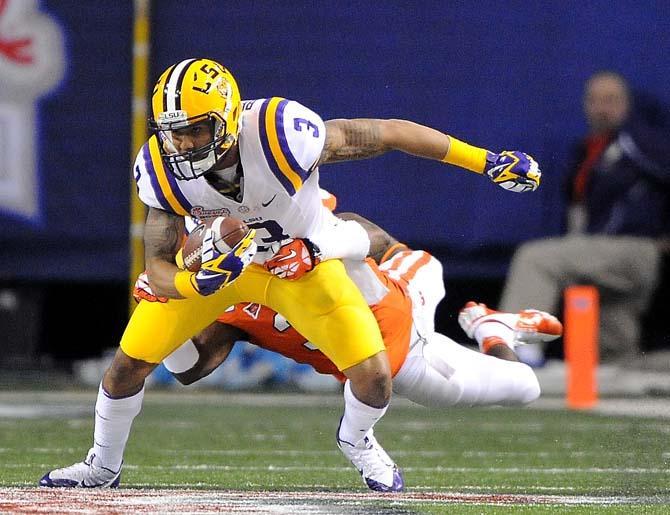 LSU sophomore wide receiver Odell Beckham Jr. is tackled Monday, Dec. 31, 2012 during the Tigers' 24-25 loss in the Chick-fil-A Bowl against Clemson in Atlanta, Ga.
 