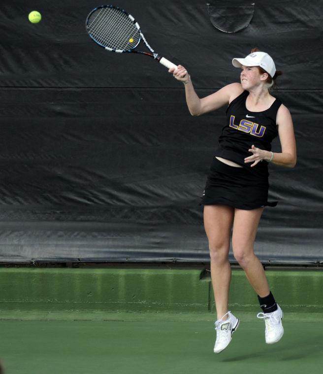 LSU freshman Caroline Hudson returns Saturday, Jan. 26, 2013 the Northwestern serve during the Tigers' doubles match against Wildcats at "Dub" Robinson Stadium.
 