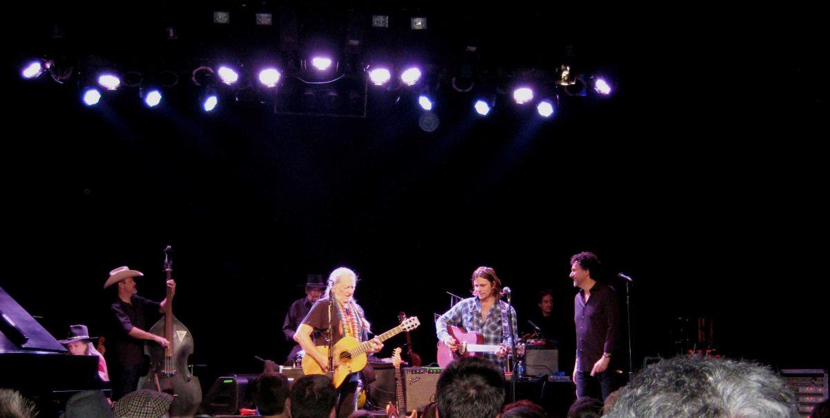 Willie Nelson (center) with son Lukas on guitar and sister Bobbie on piano