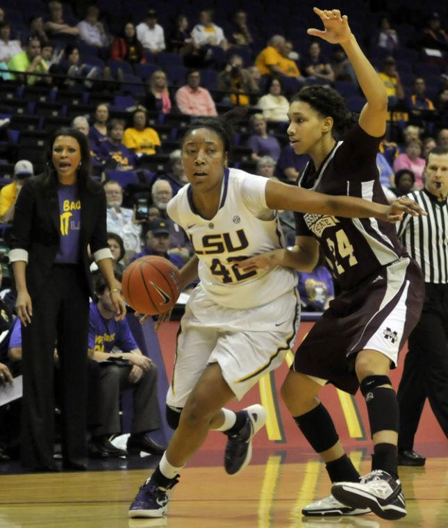 LSU sophomore forward Sheila Boykin (42) jockeys Sunday, Jan. 13, 2013 for position with Mississippi State sophomore forward J'Net Wash during the 62-42 victory over the bulldogs in the PMAC.
 