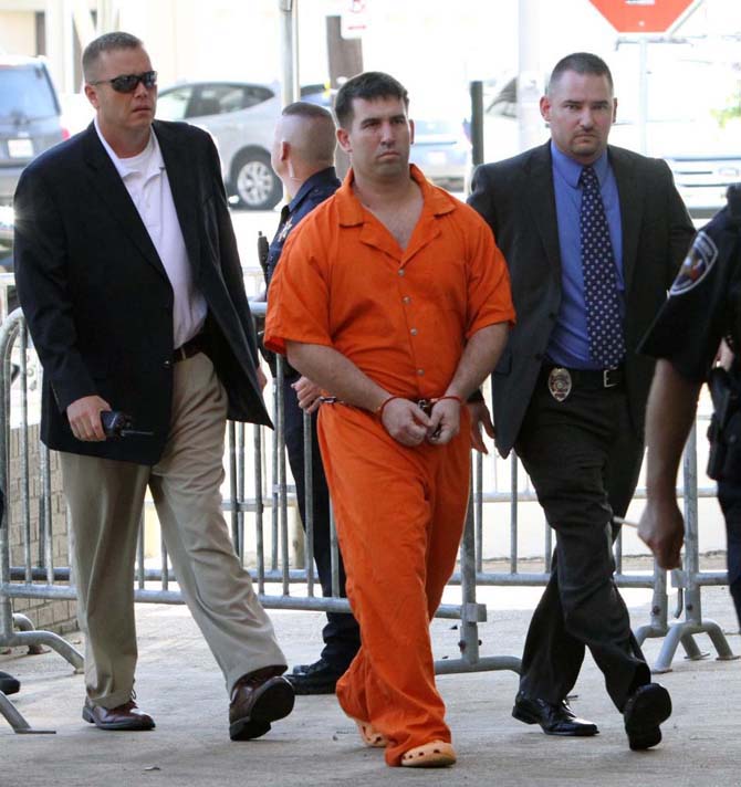 Brandon Scott Lavergne, is escorted to the Lafayette Parish Courthouse by Lt. Jack Lightfoot, left, and Detective Stephen Bajat for a hearing Friday, Aug. 17, 2012 Lafayette, La. Brandon Scott Lavergne has pleaded guilty to two counts of first-degree murder in the slayings of two Lafayette Parish women, Michaela "Mickey" Shunick of Lafayette, and Lisa Pate of Youngsville.
 