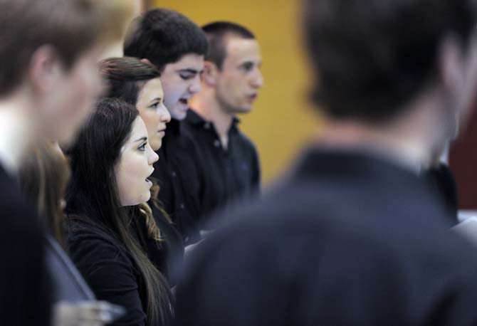 Cast members of "The Seven," a musical created by senior pre-pharmacy major Michael Braud, practice Sunday, Jan. 13, in the School of Music building. The show opens Jan. 24 on the Second Stage of Baton Rouge Little Theater.
 