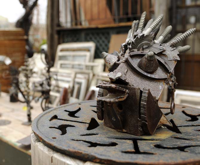 An original metalwork piece by Circa 1857 artist Joseph Jilbert sits outside next to the store on Government Street on Jan. 28, 2013.
 