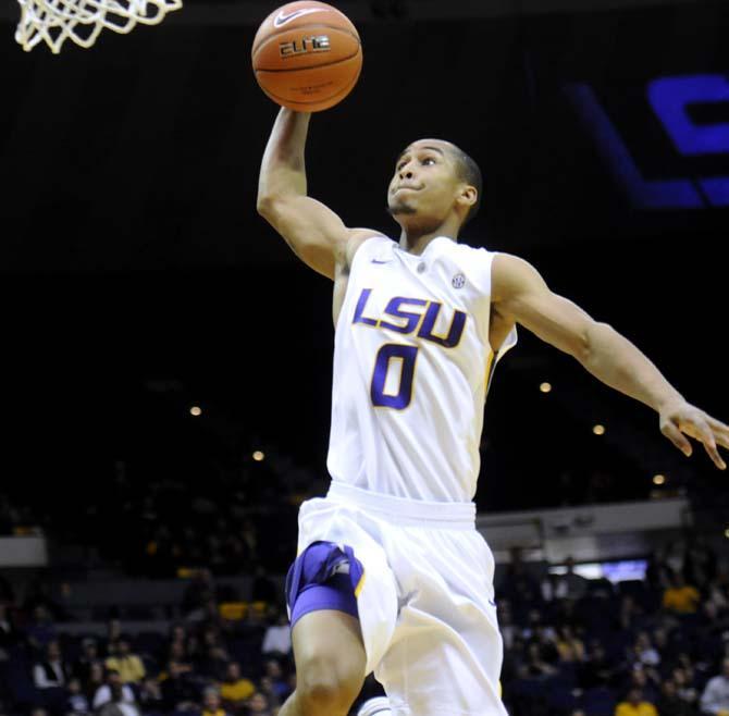 LSU senior guard Charles Carmouche (0) goes to dunk during the Tigers' 73-70 victory against Mizzou Wednesday Jan. 30, 2013 in the PMAC.
 