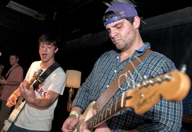 LSU electrical engineering senior Patrick Hernandez, guartist for The Shoobies, performs Saturday, Jan. 26, 2013 with mass communication junior Winston Triolo, guartist and vocalist, at The House in Tigerland.
 