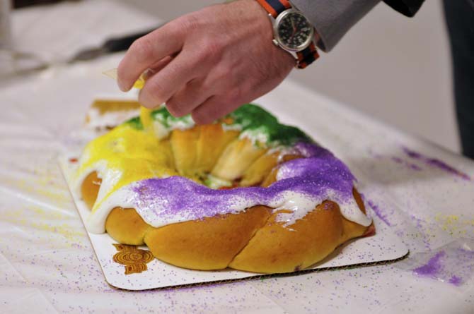 Felix Sherman Jr., the owner of Ambrosia Bakery, puts the last color of icing on the king cake during a demonstration on how to make their delicious king cakes at the LSU Museum of Art on January 17, 2012.
 