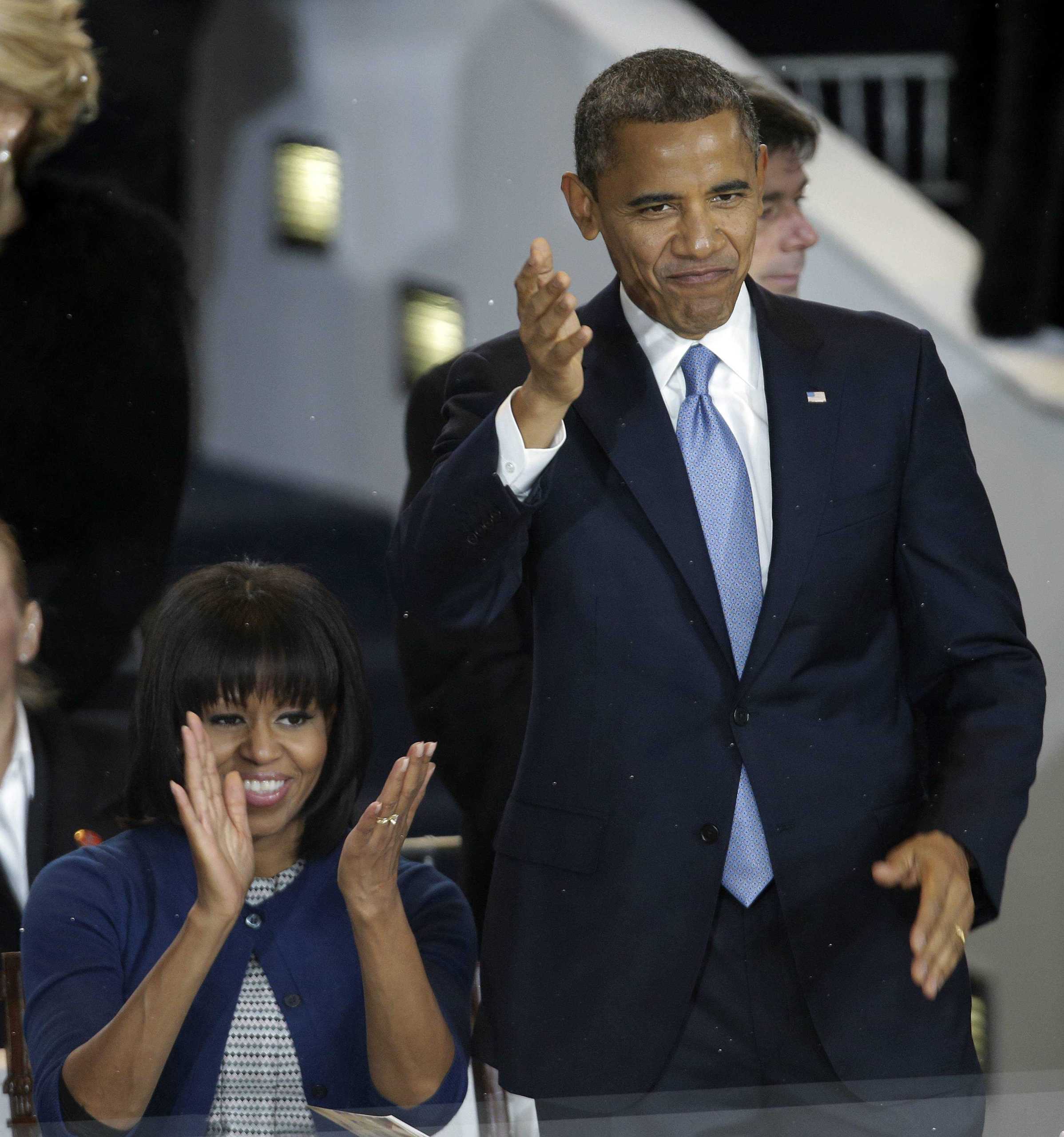 Time to act, Obama declares, taking oath 2nd time