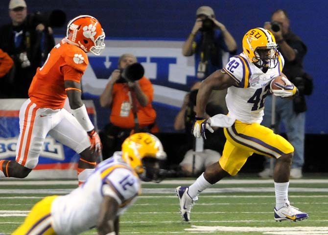 LSU junior running back Michael Ford (42) returns a punt Dec. 31 during the Tiger's 24-25 Chick-fil-A Bowl loss to Clemson.
 