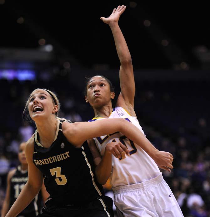 LSU senior guard Adrienne Webb (10) and Vanderbilt freshman forward Heather Bowe (2) watch Webb's shot Sunday, Jan. 20, 2013 during the 54-51 victory over the Vanderbilt Commodores in the PMAC.
 