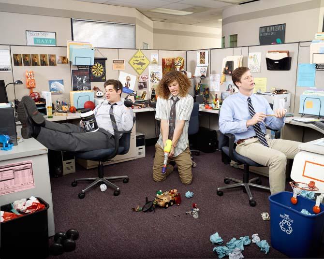 The cast of Comedy Central's "Workaholics" poses on set. Pictured from left to right: Adam Devine, Blake Anderson, Anders Holm.
 