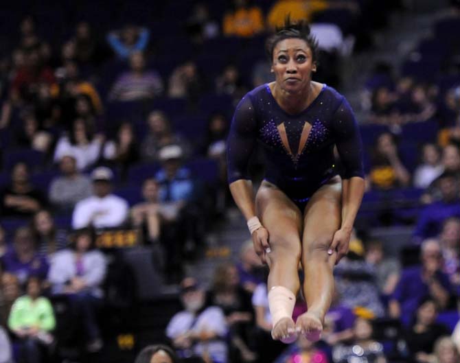 LSU junior all-around Maliah Mathis flips during a floor routine Friday, Jan. 11, 2013 during the Tiger's 196.875-196.575 win over Florida in the PMAC.
 