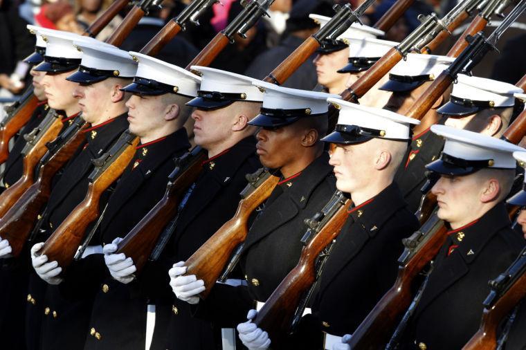 Members of the Marine Corps march in President Barack Obama's inaugural parade in Washington, Monday, Jan. 21, 2013, following the president's ceremonial swearing-in ceremony during the 57th Presidential Inauguration. (AP Photo/Jose Luis Magana)
 