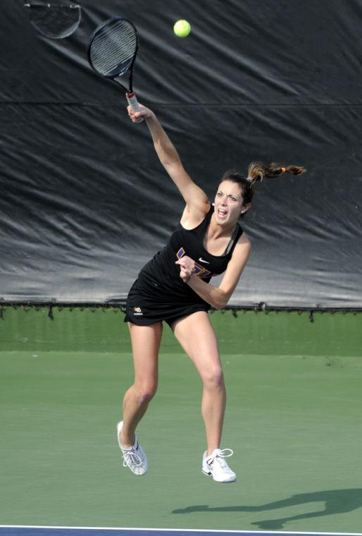 LSU senior Kaitlin Burns serves Saturday, Jan. 26, 2013 during the doubles match against Northwestern at "Dub" Robinson Stadium.
 