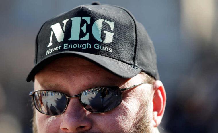 Bret Hankes, of Clarksville, Tenn., attends a demonstration by gun rights advocates on Saturday, Jan. 19, 2013, in Nashville, Tenn. Supporters of gun rights held "Guns Across America" rallies across the country Saturday in response to President Barack Obama's plan to curb gun violence. Hankes is a firearms dealer who specializes in AK assault rifles. (AP Photo/Mark Humphrey)
 