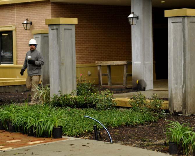 A construction worker walks inside the construction zone for the new African American Cultural Center. The Center is slated to be completed later this spring, and will feature bigger, multipurpose rooms, and its own library.
 