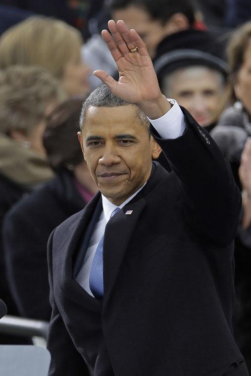 President Barack Obama waves after delivering his Inaugural address at the ceremonial swearing-in at the U.S. Capitol during the 57th Presidential Inauguration in Washington, Monday, Jan. 21, 2013. (AP Photo/Carolyn Kaster)
 