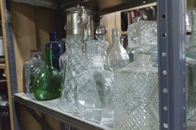 Glass bottles used in past LSU Theater plays fill shelves in the Music and Dramatic Arts building. Tues, Jan. 15, 2013
 