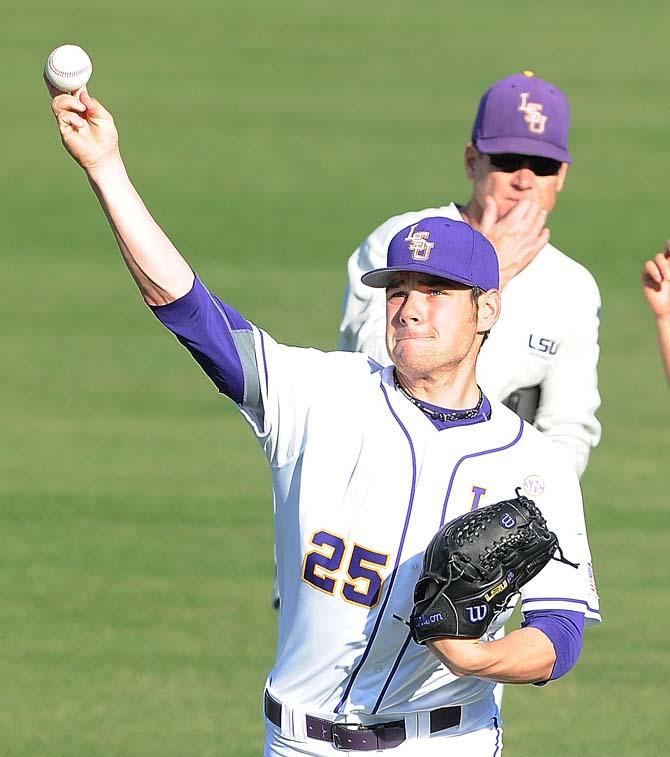 LSU senior pitcher Joey Bourgeois (25) warms up Jan. 25, 2013 during the Tiger's first preseason practice in Alex Box Stadium.
 