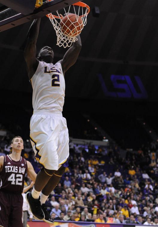 LSU sophomore Johnny O'Bryant III (2) dunks Wednesday, Jan. 23, 2013 in the 58-54 victory over Texas A&amp;M in the PMAC.
 