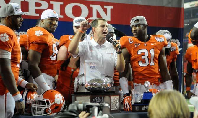 Clemson football head coach Dabo Swinney speaks to a crowd of fans and players Dec. 31, 2012 following their 25-24 win over LSU in the Chick-fil-A Bowl in Atlanta, Ga.
 