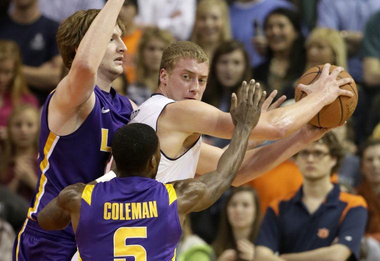 Auburn center Rob Chubb (41) is guarded by LSU forward Shavon Coleman (5) and center Andrew Del Piero (55) in the first half of an NCAA college basketball game at Auburn Arena in Auburn, Ala., Wednesday, Jan. 9, 2013. (AP Photo/Dave Martin)
 