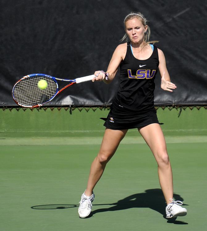 LSU junior Ariel Morton returns a volley Saturday, Jan. 26, 2013 during the doubles match against Northwestern at "Dub" Robinson Stadium.
 