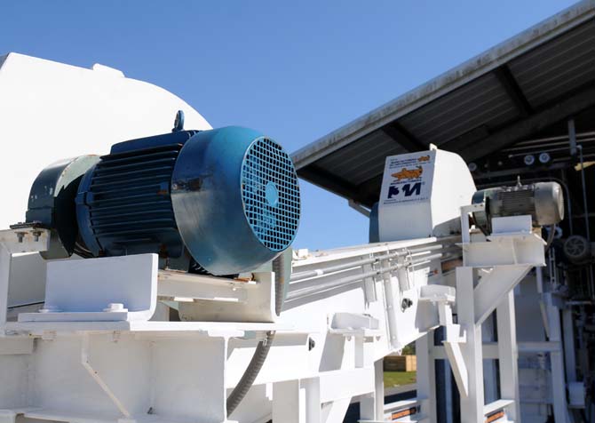 New feedstock processing equipment sits outside Wednesday, Jan. 23, 2013 at the Audubon Sugar Institute in St. Gabriel, La. The machine takes feedstock such as sugarcane and turns it into syrup.
 