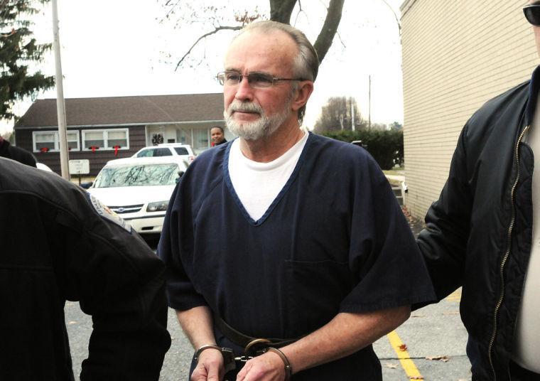 FILE -- In a Dec. 11, 2012, file photo, retired Pennsylvania pastor Arthur Schirmer is lead away from the Lebanon County Courthouse after a preliminary hearing in Lebanon, Pa. Schirmer is charged with killing both of his wives and is on trial in the death of his second wife. &#160; (AP Photo/Lebanon Daily News, Earl Brightbill) THE PATRIOT-NEWS OUT
 