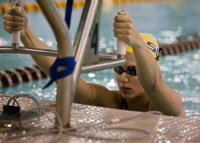 LSU sophomore Katline Sepp gets ready to take her mark before the 200 yard backstroke event at the girl's meet against Tulane, Rice, and Houston in the Natatorium on Jan. 26, 2013.
 