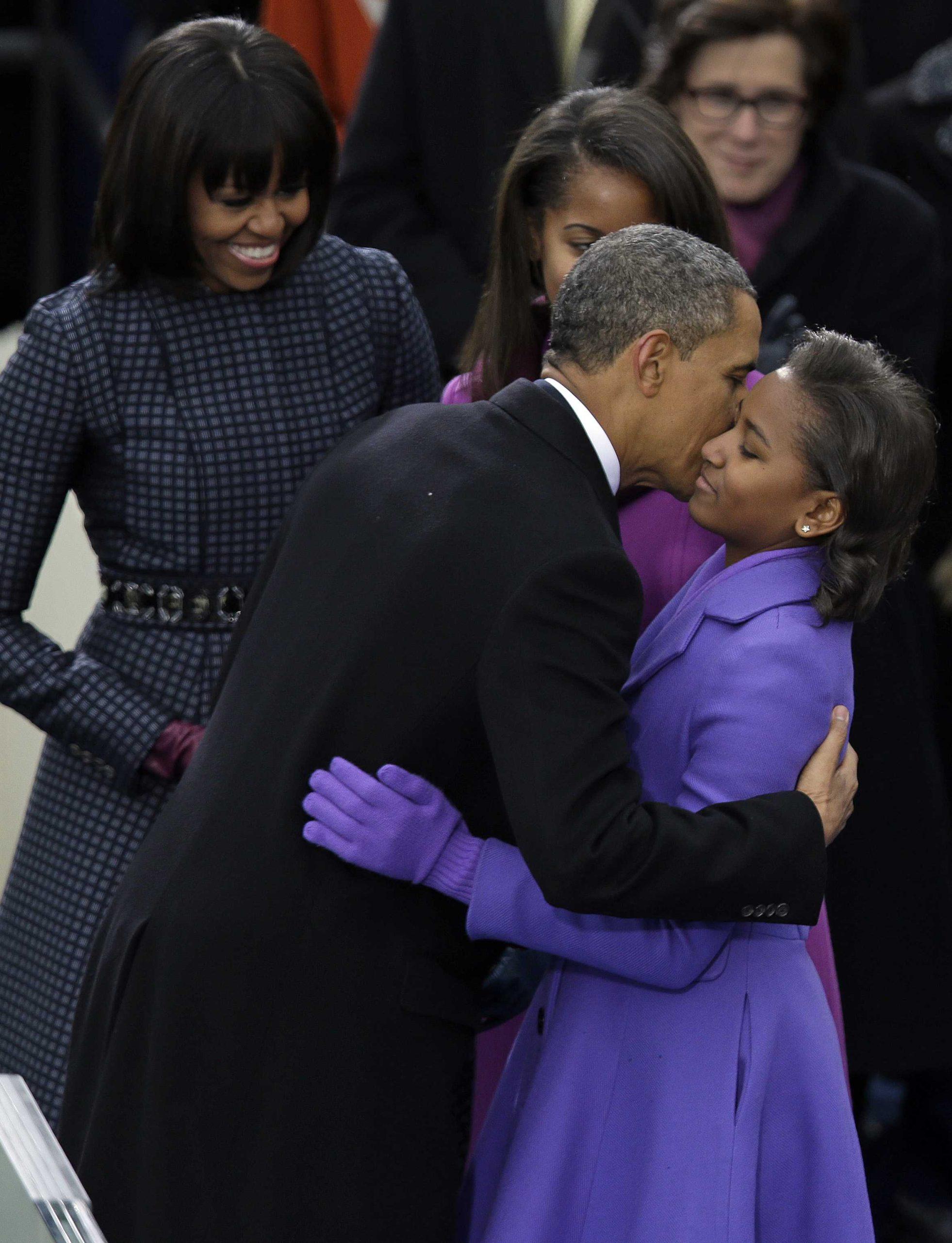 Time to act, Obama declares, taking oath 2nd time