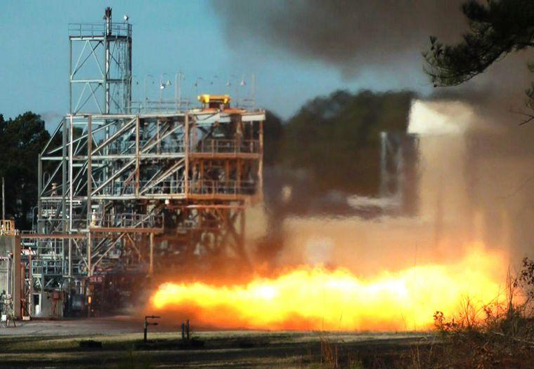 In an image made from video NASA engineers test fire a key part of a rocket engine left over from the 1960s-era Apollo moon missions on Thursday, Jan. 24, 2013, in Huntsville, Ala. Engineers hope to gain valuable knowledge from the engine, which was originally supposed to power the Apollo 11 moon mission in 1969 but was grounded by a problem. (AP Photo/Nasa)
 