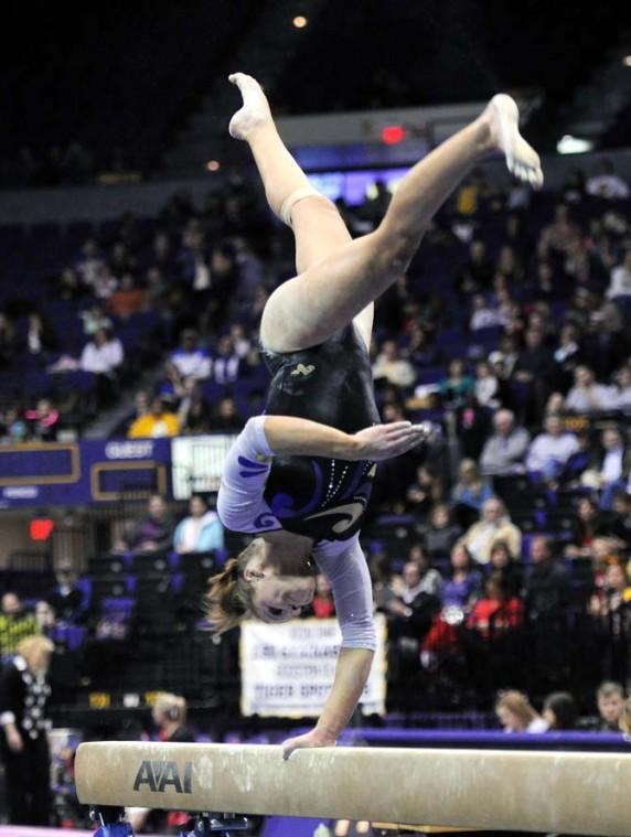 LSU junior all-around Kaleigh Dickson flips on a balance beam Jan. 4, 2013 during the Tiger's 196-194 win over NC State in the PMAC.
 