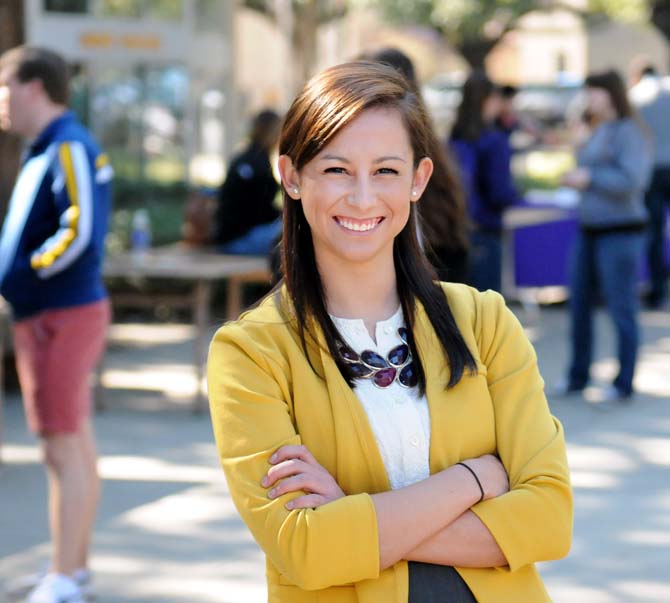 Student Government's Chief Justice Morgan Faulk stands in front of Free Speech Alley Tuesday, Jan. 22, 2013. She is the first new Chief Justice elected in the past three and a half years.
 