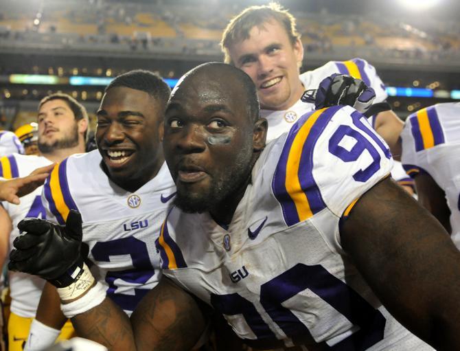 LSU sophomore defensive tackel Anthony Johnson (90) sings the alma mater after the Tiger's 37-17 victory over Mississippi State University Bulldogs on Saturday, Nov. 10, 2012 in Tiger Stadium.