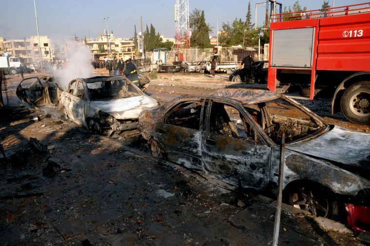 In this photo released by the Syrian official news agency SANA, damages cars are seen after an explosion hit a university in Aleppo, Syria, Tuesday, Jan. 15, 2013. Two explosions struck the main university in the northern Syrian city of Aleppo on Tuesday, causing an unknown number of casualties, state media and anti-government activists said. There were conflicting reports as to what caused the blast at Aleppo University, which was in session Tuesday. (AP Photo/SANA)
 