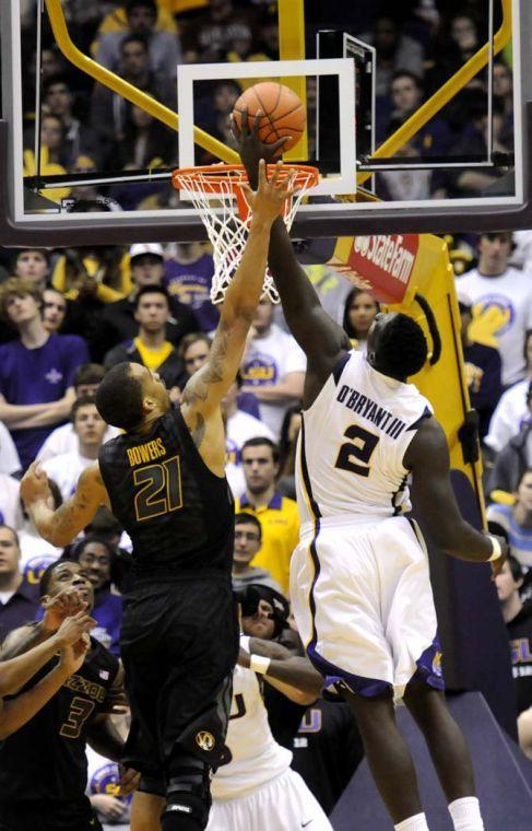 LSU sophomore forward Johnny O'Bryant III (2) takes a rebound from Missouri senior forward Laurence Bowers (21) during the Tigers' 73-70 victory against Mizzou Wednesday Jan. 30, 2013 in the PMAC.
 