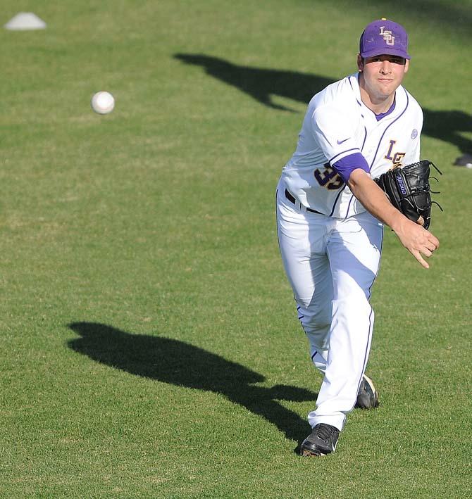 LSU senior pitcher Kevin Berry (33) throws the ball Jan. 25, 2013 during the Tiger's first preseason practice in Alex Box Stadium.
 