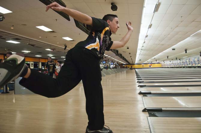 Justin Bui, psychology sophomore and president of the bowling club, practices Sunday morning, Jan. 20, 2013. at All Star Lanes on Airline Highway. Bui is the most recent in a long line of bowlers in his family.
 