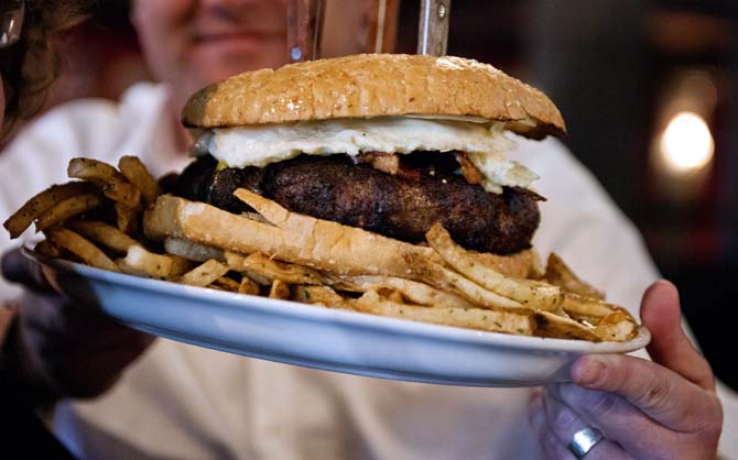 The "Big Ben" burger is brought out from the kitchen in The Londoner. The burger weighs forty ounces. If a customer is able to eat the burger with its bed of fries, the meal is on the house. If unable to finish it, the customer will have to pay full price, which is $30.00.
 