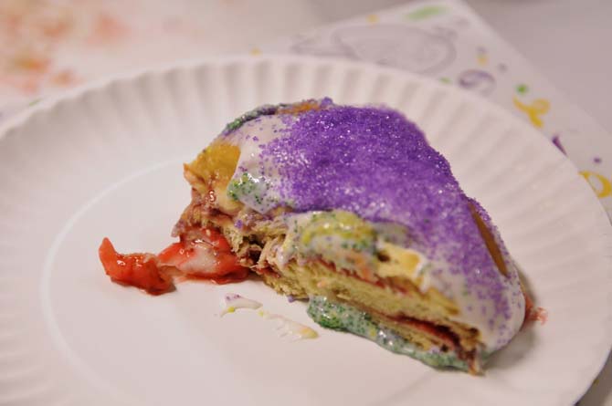 A slice of a finished king cake sits ready to be cut and eaten during a demonstration on how to make Ambrosia Bakery's king cakes done by the co-owner, Felix Sherman, Jr., at the LSU Museum of Art on January 17, 2012.
 