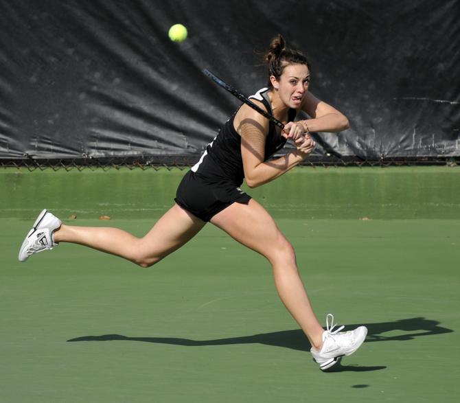 LSU senior Kaitlin Burns returns the volley Saturday, Jan. 26, 2013 during the doubles match against Northwestern at "Dub" Robinson Stadium.
 