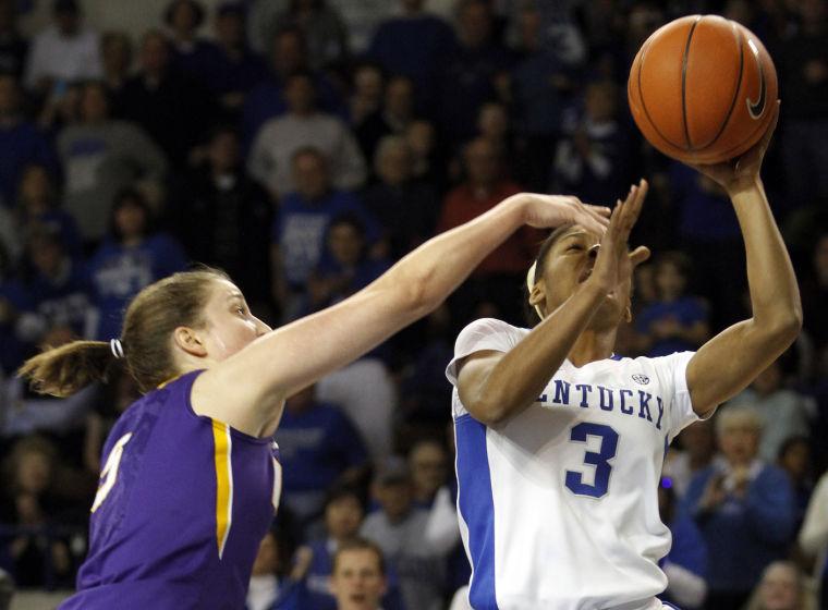 Kentucky's Janee Thompson (3) is fouled by LSU's Jeanne Kenney during the second half of an NCAA college basketball game at Memorial Coliseum in Lexington, Ky., Sunday, Jan. 27, 2013. Kentucky defeated LSU 73-60. (AP Photo/James Crisp)
 