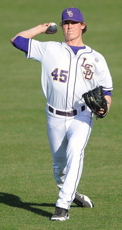 LSU freshman pitcher Russell Reynolds (45) warms up Jan. 25, 2013 before the Tiger's first preseason practice in Alex Box Stadium.
 