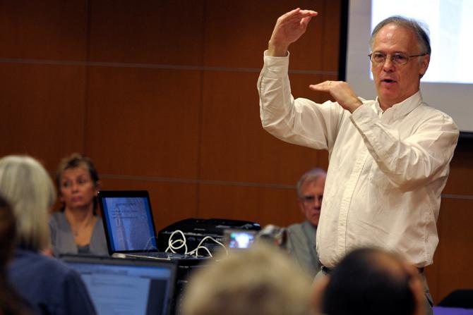 LSU finance professor Don Chance presents a slideshow in support of changing the University's grading system to a "plus or minus" system on Tuesday, Oct. 2, 2012, at the Faculty Senate meeting. Chance proposed the new grading system, which he claims would allow for more accuracy and flexibility in grading.